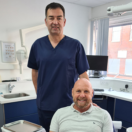 Cheshire dental implant expert Professor Julian Yates with implant patient Iain Cotterill